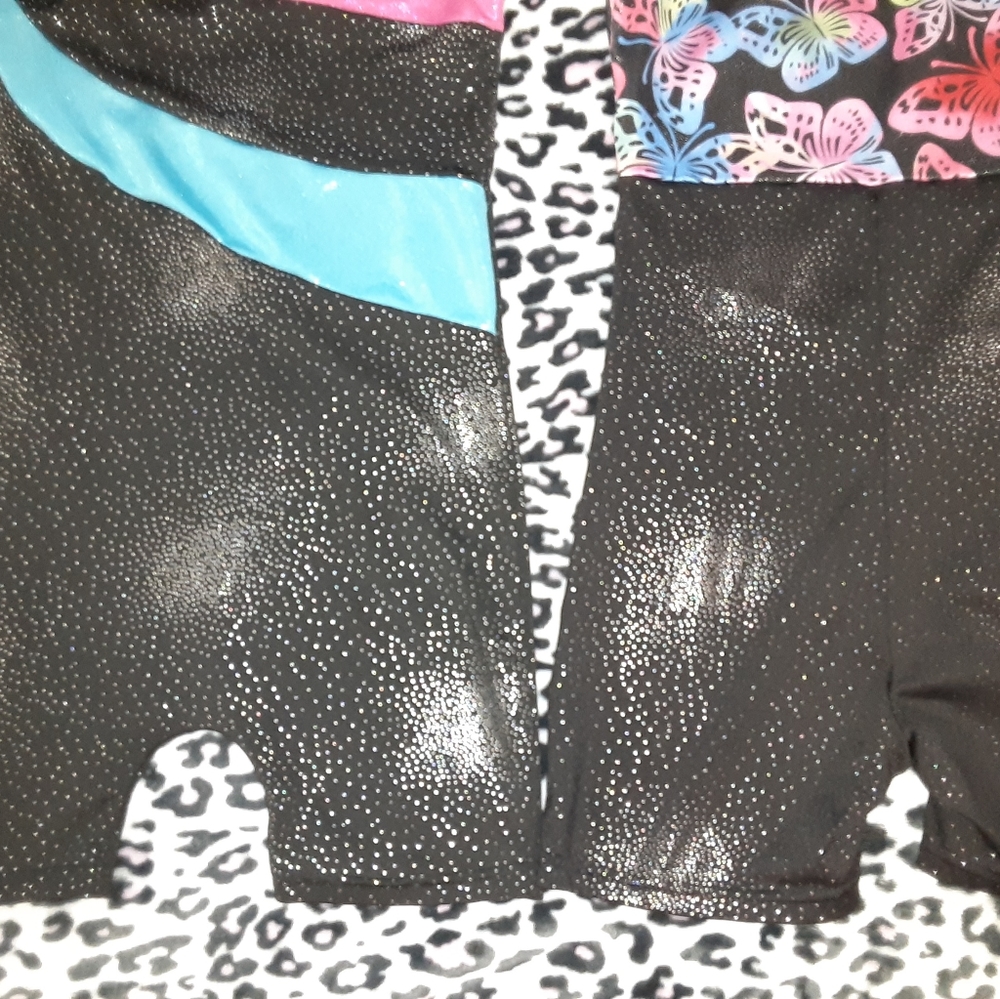 Gymnastic leotard Sz 6 and Sz 7. Multiple prints....$10 each